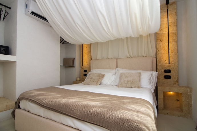 Imagen de la habitación del Borgo Bevagna Relais. Foto 7