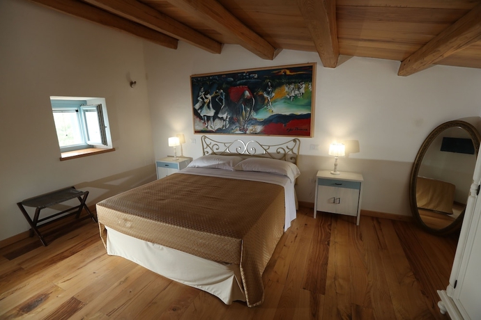 Imagen de la habitación del Borgo Rosso di Sera Resort Country Chic. Foto 3