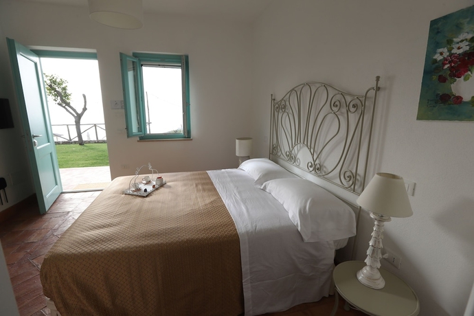 Imagen de la habitación del Borgo Rosso di Sera Resort Country Chic. Foto 7