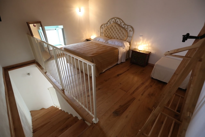 Imagen de la habitación del Borgo Rosso di Sera Resort Country Chic. Foto 10
