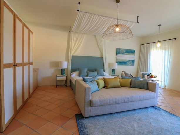 Imagen de la habitación del Borgo Smeraldo ResortandVillas. Foto 2