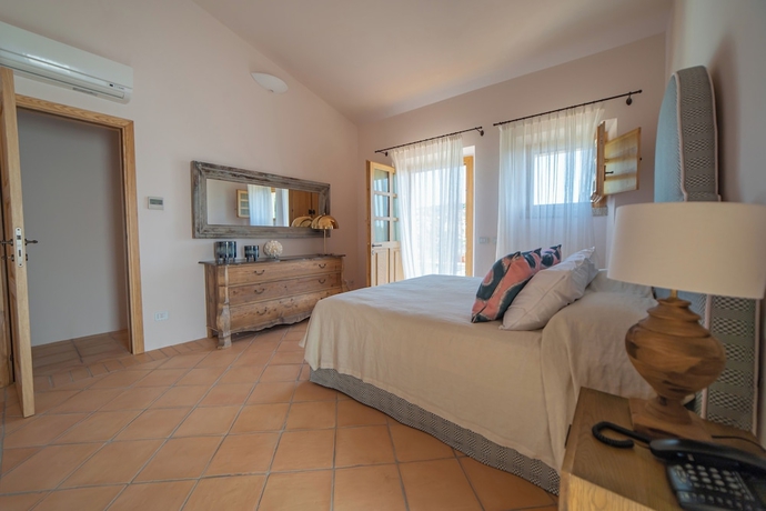 Imagen de la habitación del Borgo Smeraldo ResortandVillas. Foto 10