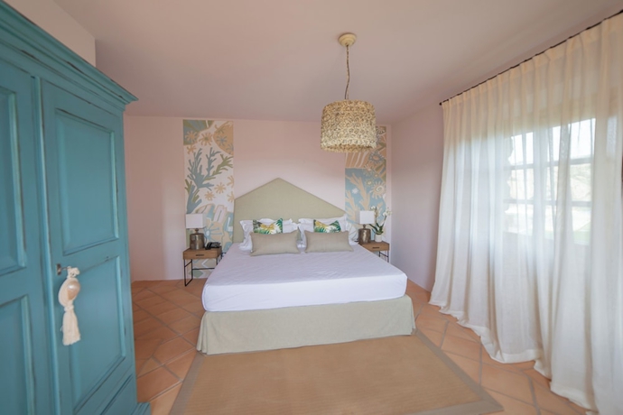 Imagen de la habitación del Borgo Smeraldo ResortandVillas. Foto 11