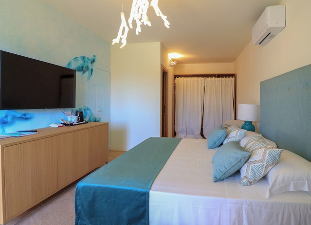 Imagen de la habitación del Borgo Smeraldo ResortandVillas. Foto 12