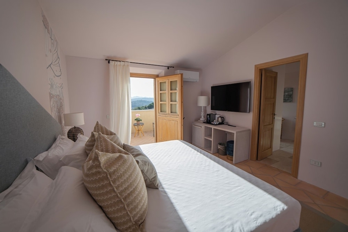 Imagen de la habitación del Borgo Smeraldo ResortandVillas. Foto 14
