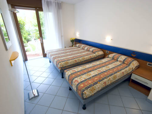 Imagen de la habitación del Bosco Canoro West Bibione Residence. Foto 3