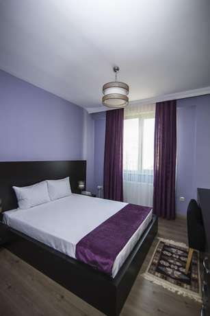 Imagen de la habitación del Bossuite Hotel Maltepe. Foto 11