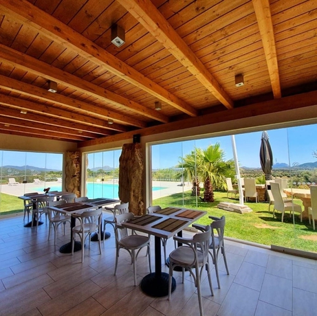 Imagen del bar/restaurante del Botanic Golf SaCuba and Resort. Foto 12