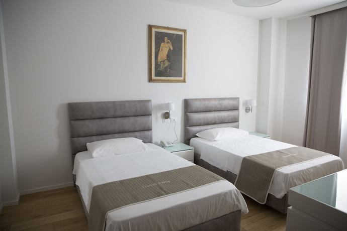 Imagen de la habitación del Boutique Hotel Enia, Prato. Foto 5