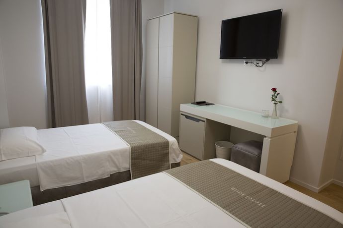 Imagen de la habitación del Boutique Hotel Enia, Prato. Foto 7