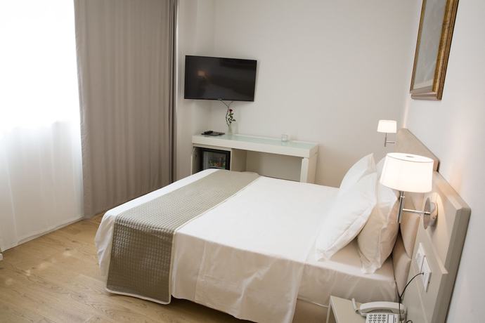 Imagen de la habitación del Boutique Hotel Enia, Prato. Foto 14