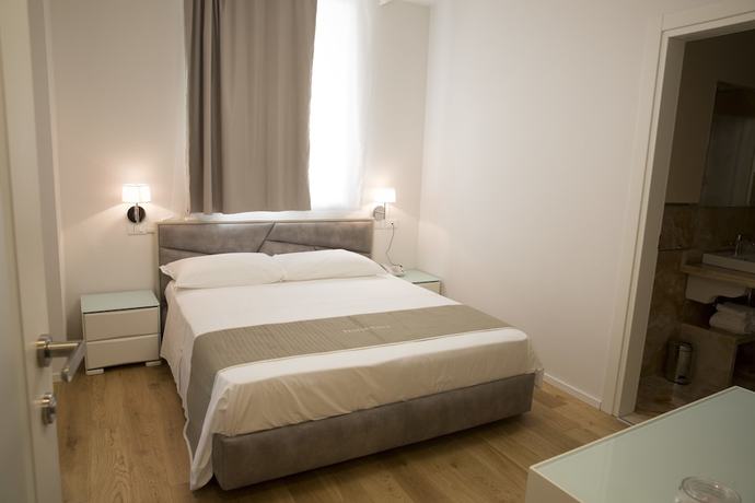 Imagen de la habitación del Boutique Hotel Enia, Prato. Foto 15