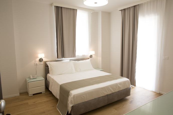 Imagen de la habitación del Boutique Hotel Enia, Prato. Foto 16