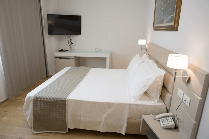 Imagen de la habitación del Boutique Hotel Enia, Prato. Foto 2