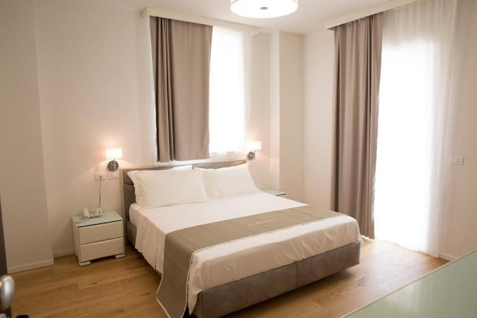 Imagen de la habitación del Boutique Hotel Enia, Prato. Foto 8