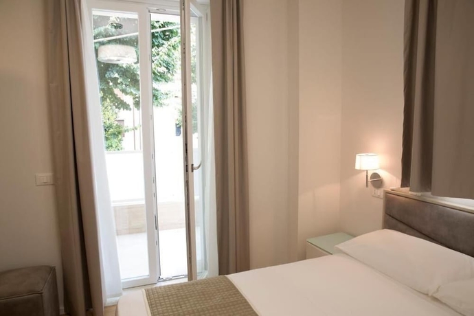 Imagen de la habitación del Boutique Hotel Enia, Prato. Foto 10