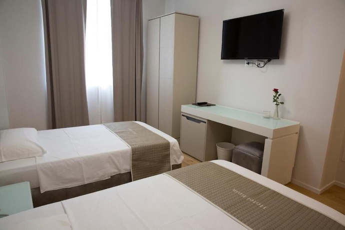 Imagen de la habitación del Boutique Hotel Enia, Prato. Foto 11