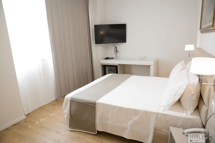 Imagen de la habitación del Boutique Hotel Enia, Prato. Foto 14