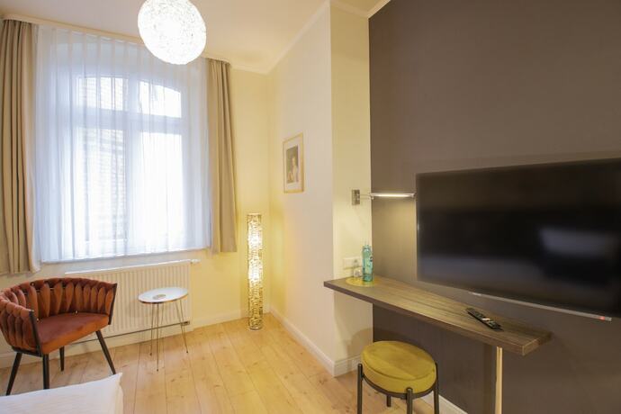Imagen de la habitación del Boutique Hotel Schwarzer Baer. Foto 11