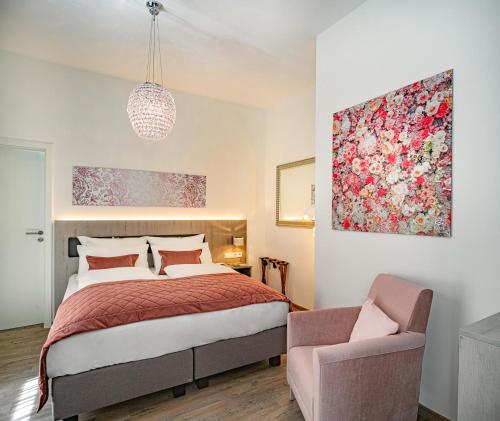 Imagen de la habitación del Boutique Rose Baden-baden. Foto 7