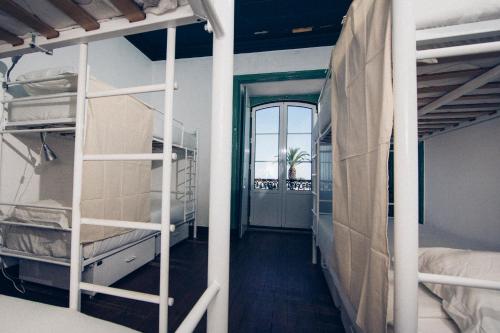 Imagen de la habitación del Boutique Taghostel. Foto 19