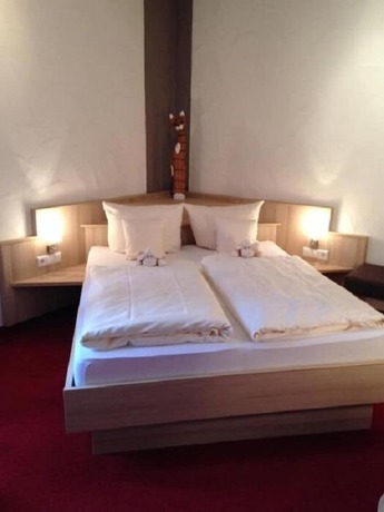 Imagen de la habitación del Boutique-Hotel Lohspeicher. Foto 14