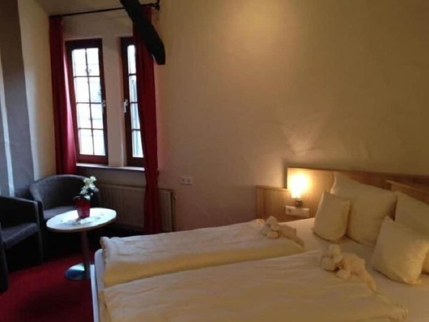 Imagen de la habitación del Boutique-Hotel Lohspeicher. Foto 15