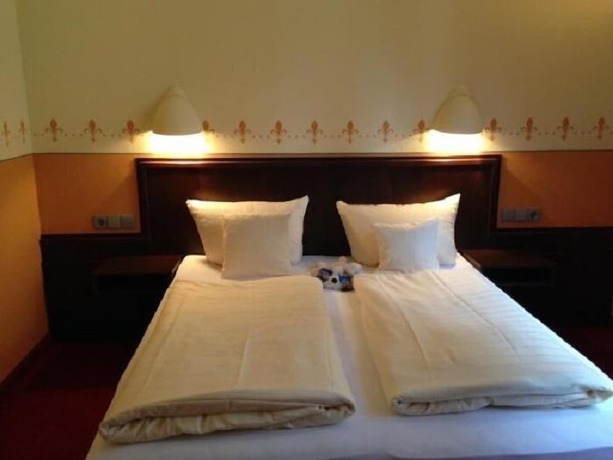 Imagen de la habitación del Boutique-Hotel Lohspeicher. Foto 18