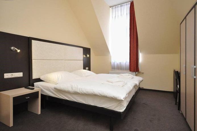 Imagen de la habitación del Bova Hotel Frankfurt. Foto 11