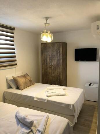 Imagen de la habitación del Bozcaada Ersin Konak. Foto 17