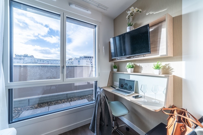 Imagen de la habitación del Break and Home Clermont-Ferrand. Foto 10