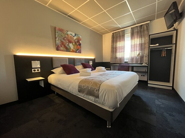 Imagen de la habitación del Brit Hotel Le Vesoul. Foto 18