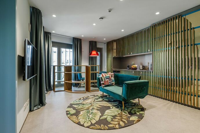 Imagen de la habitación del Brucklyn Suites. Foto 19