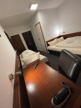 Imagen de la habitación del Brunnen Hotel. Foto 10