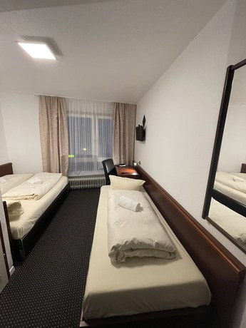 Imagen de la habitación del Brunnen Hotel. Foto 14