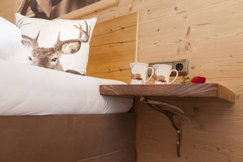 Imagen de la habitación del Brunnenhof Oberstdorf - Ferienwohnungen Mit Hotel. Foto 3