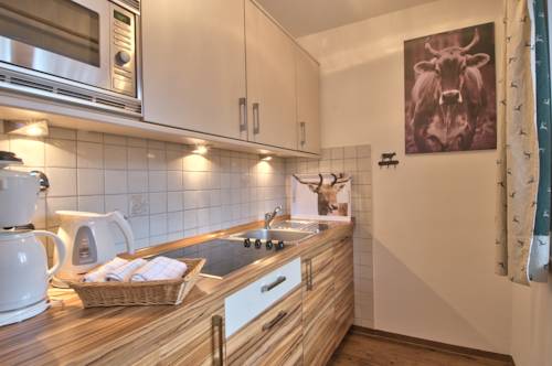 Imagen de la habitación del Brunnenhof Oberstdorf - Ferienwohnungen Mit Hotel. Foto 5