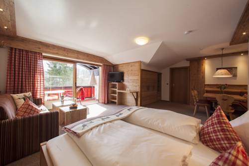 Imagen de la habitación del Brunnenhof Oberstdorf - Ferienwohnungen Mit Hotel. Foto 7
