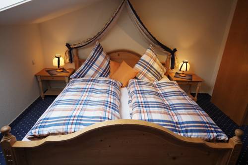 Imagen de la habitación del Brunnenhof Oberstdorf - Ferienwohnungen Mit Hotel. Foto 12