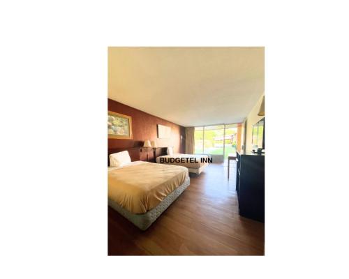 Imagen de la habitación del Budgetel Inn. Foto 20