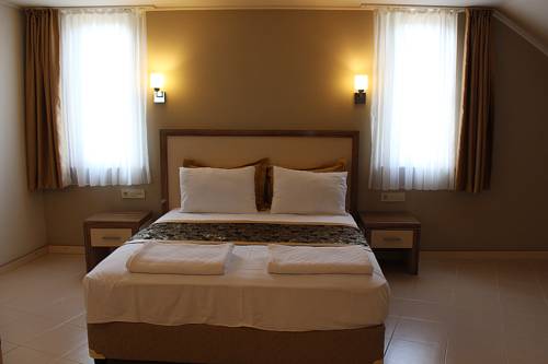 Imagen de la habitación del Buhana Hotel. Foto 6