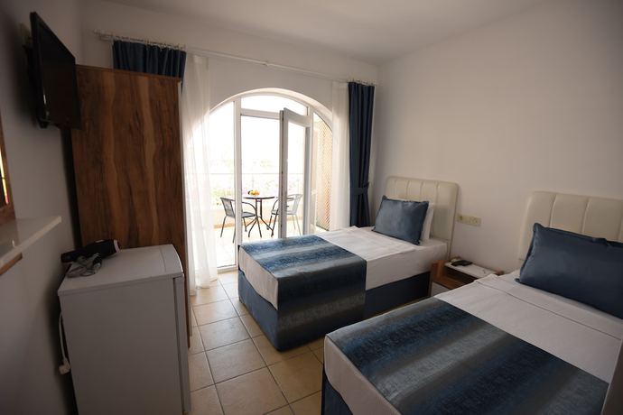 Imagen de la habitación del Bumerang Suites Hotel. Foto 4