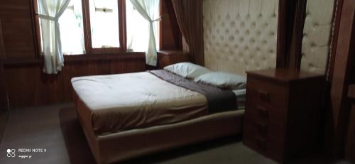 Imagen de la habitación del Bungalow kampoengstrawberry ciwidey. Foto 18