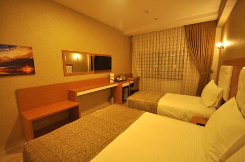 Imagen de la habitación del Bupa Hotel. Foto 5