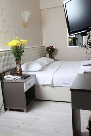 Imagen de la habitación del Bursa City Hotel. Foto 14