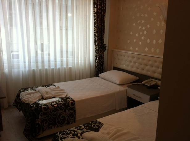 Imagen de la habitación del Bursa City Hotel. Foto 16