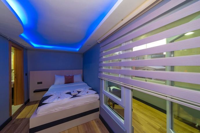 Imagen de la habitación del Butterfly Suites. Foto 16