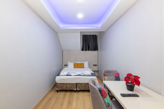 Imagen de la habitación del Butterfly Suites. Foto 18