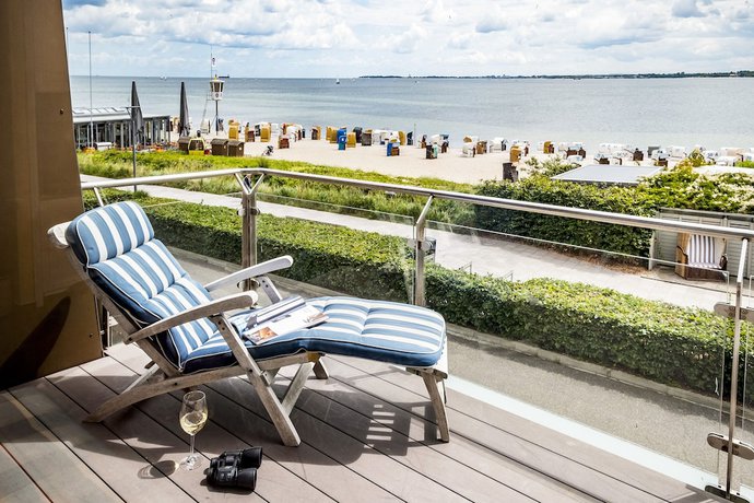 Imagen de la habitación del B&uuml;ngers Apartment-Hotel mit Gartensauna - modern, gem&uuml;tlich und strandnah. Foto 11