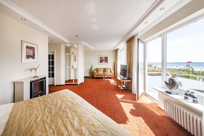 Imagen de la habitación del B&uuml;ngers Apartment-Hotel mit Gartensauna - modern, gem&uuml;tlich und strandnah. Foto 16